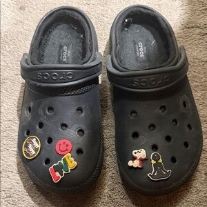CROCS Black Clogs with Colorful Charms